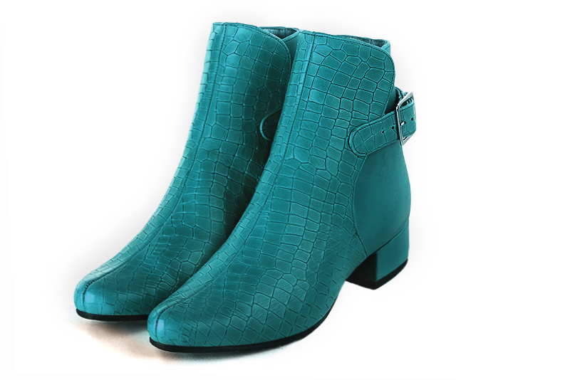 French elegance and refinement for these turquoise blue dress booties, with buckles at the back, 
                available in many subtle leather and colour combinations. Customise or not, with your materials and colours.
This charming ankle boot fits snugly around the ankle.
It closes on the outside with a buckle.  
                Matching clutches for parties, ceremonies and weddings.   
                You can customize these buckle ankle boots to perfectly match your tastes or needs, and have a unique model.  
                Choice of leathers, colours, knots and heels. 
                Wide range of materials and shades carefully chosen.  
                Rich collection of flat, low, mid and high heels.  
                Small and large shoe sizes - Florence KOOIJMAN